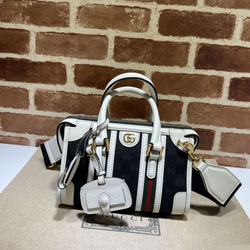 G*u*i top handle bags